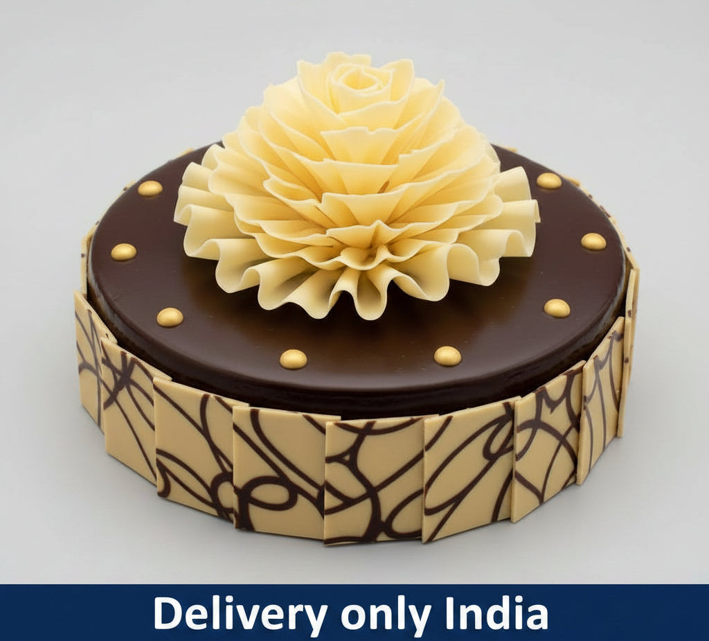 Smooth Finish Chocolate Flower Cake — dark smooth finish with a large pale flower-style decoration; India