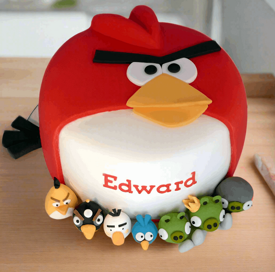 Angry Bird Cake — a red Angry Birds character and small bird decorations; India