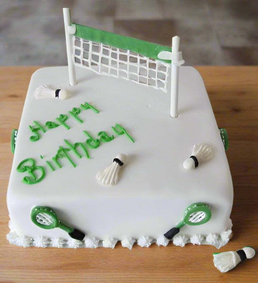 Badminton Court Design Cake — white court design, green borders and a badminton net; India