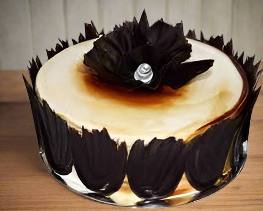 Designer Chocolate Cake — pale centre surrounded by dark pointed side panels; India