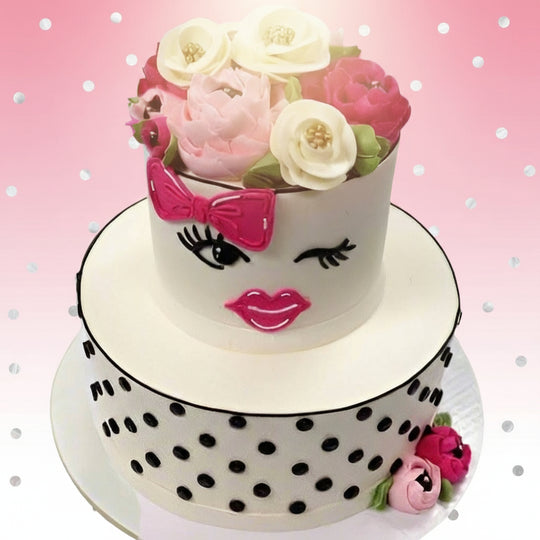 Cake for Your Girl — a face design, bow and pink floral topping; India