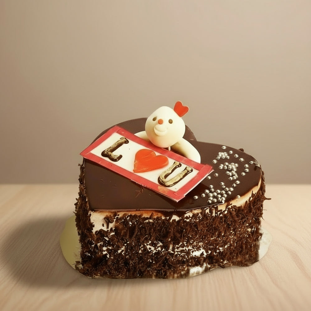 Black Forest - Love You Cake — dark textured sides, a red photo-style panel and a small teddy figure; India
