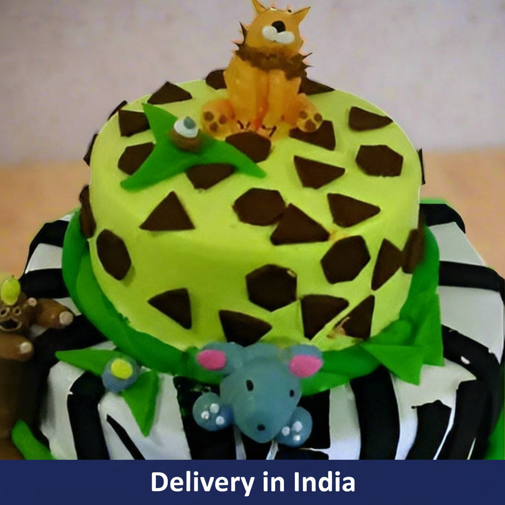 Animal Theme Cake — green animal-themed top and zebra-patterned lower tier; India