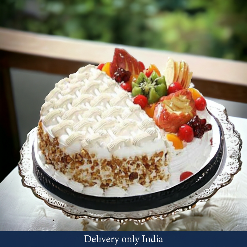 Butterscotch Fruit and Cream Cake — cream-frosted top with mixed fruit on one half; India