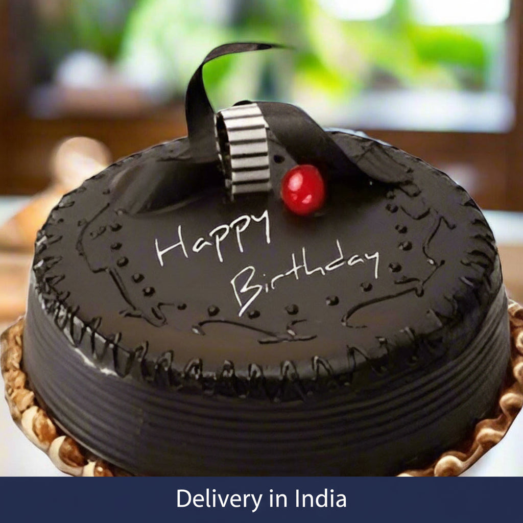Ridged Chocolate Truffle Birthday Cake — dark ridged sides, birthday lettering and fan-shaped topping; India