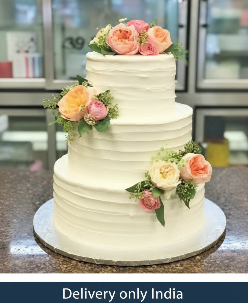 Pastel Rose Engagement Cake — pale engagement finish with pastel rose decoration; India