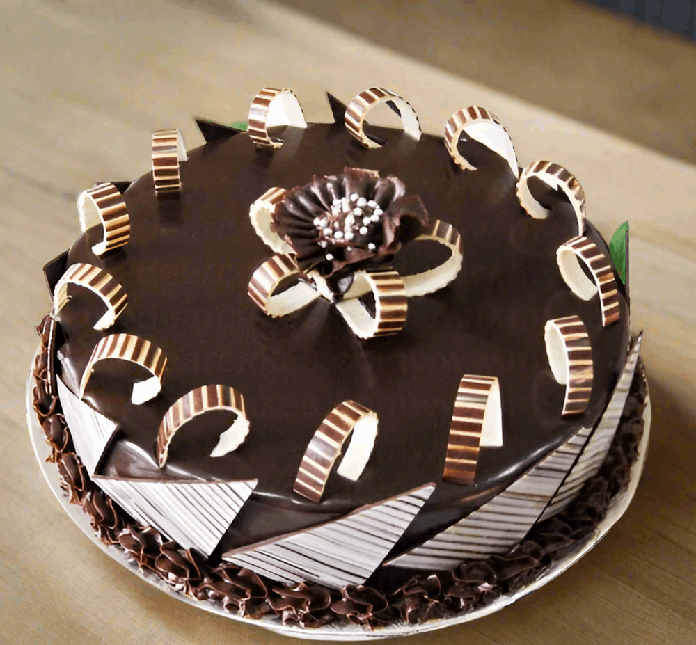 Striped Decor Chocolate Delight Cake — dark glaze and striped decorative curls; India
