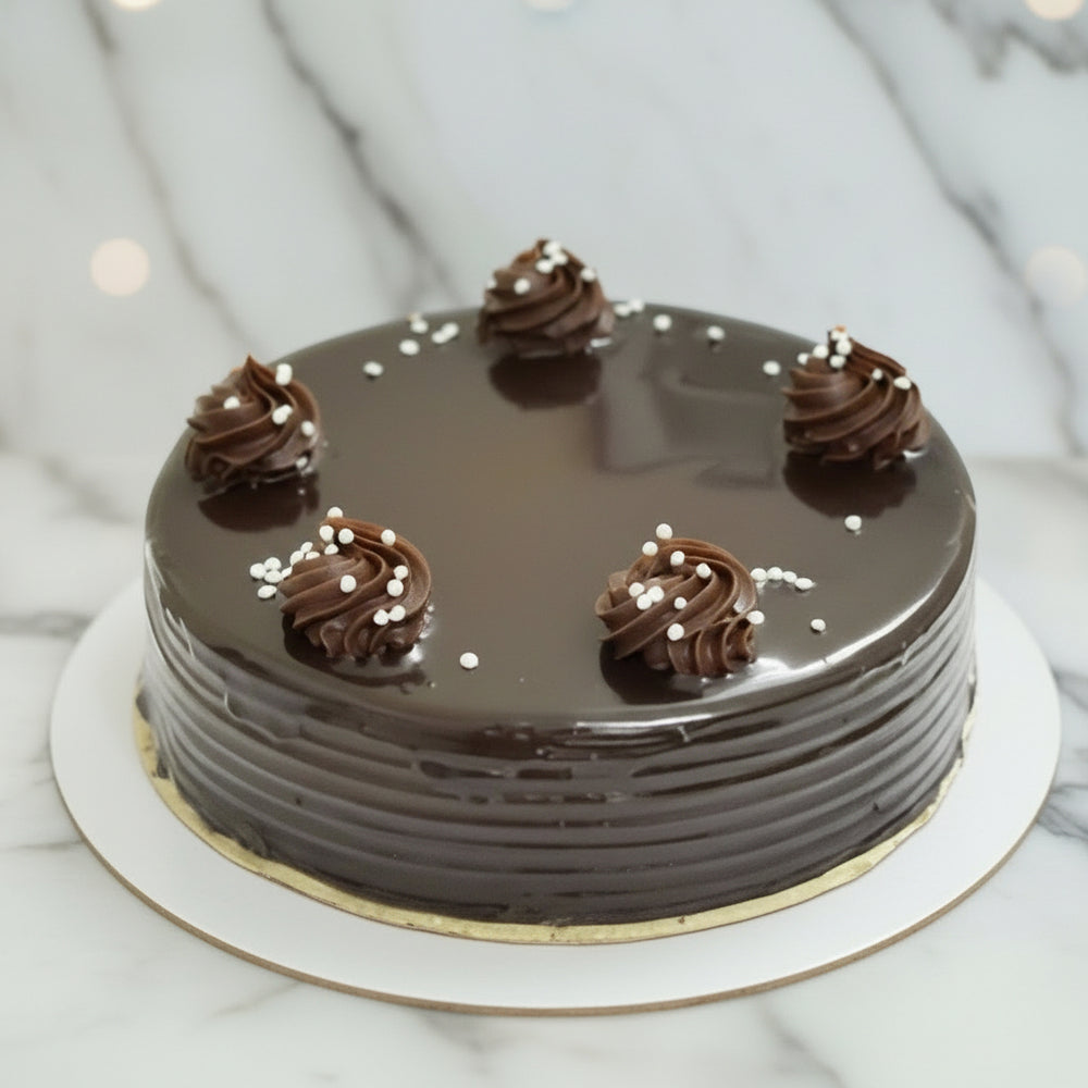 Celebration Chocolate Delight Cake — grey-brown ridged frosting and evenly spaced piped dollops; India
