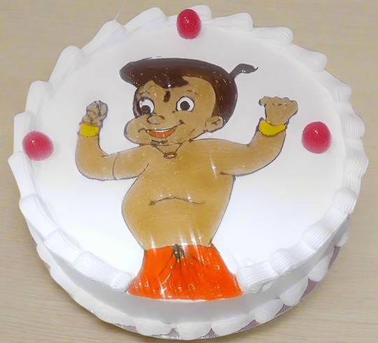 Pineapple Bheem Cake — white cream border and a Bheem cartoon-style central design; India