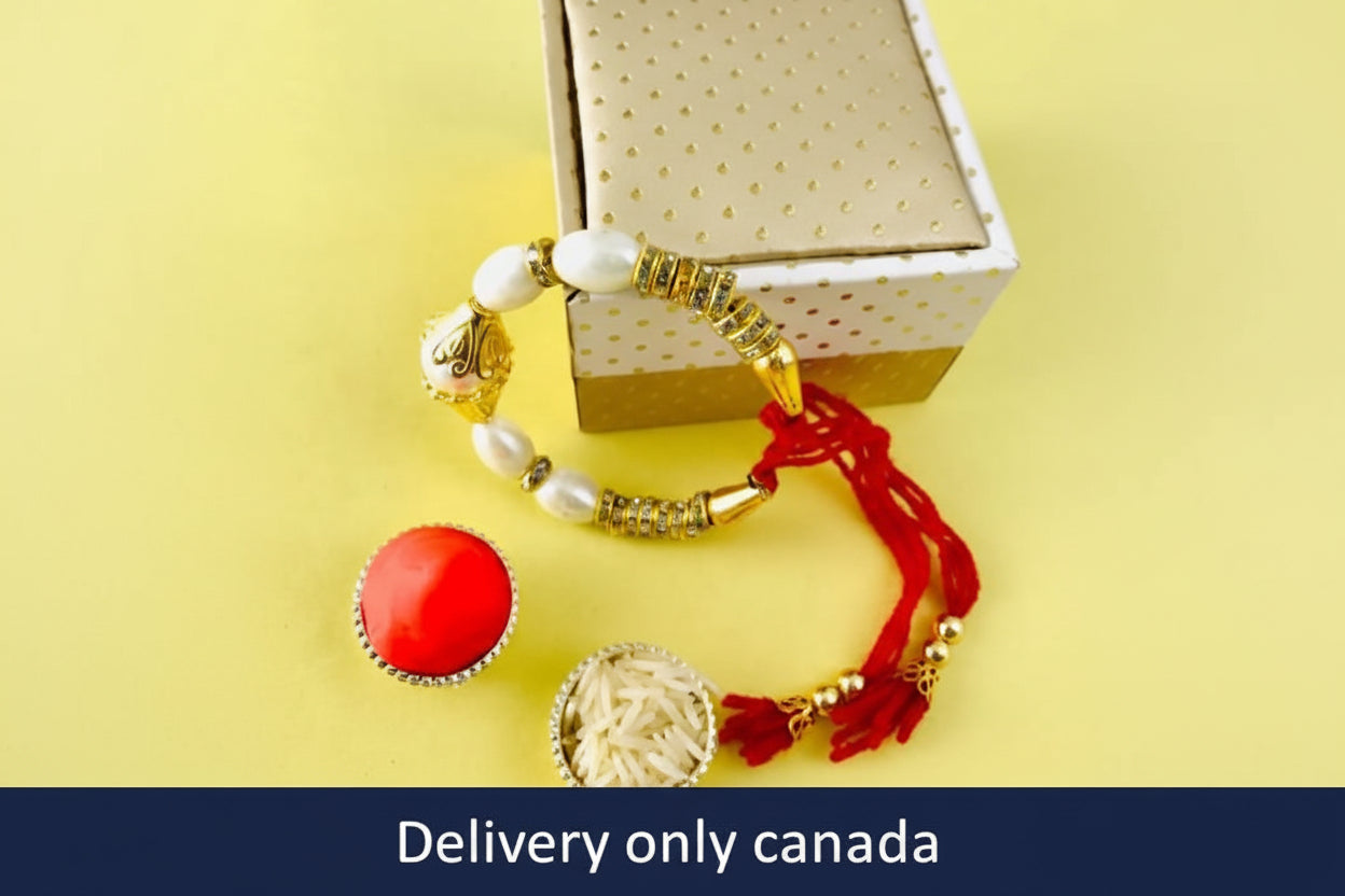 Bracelet with red charm and gold accents on a yellow background