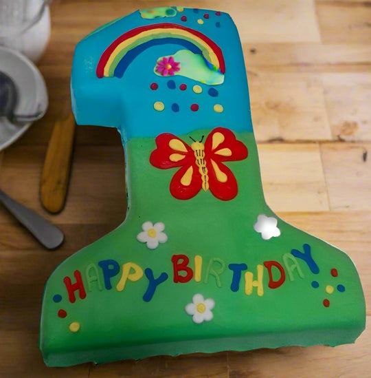 Colourful Number 1 Birthday Cake — a bright blue-and-green number 1 design with colourful motifs; India