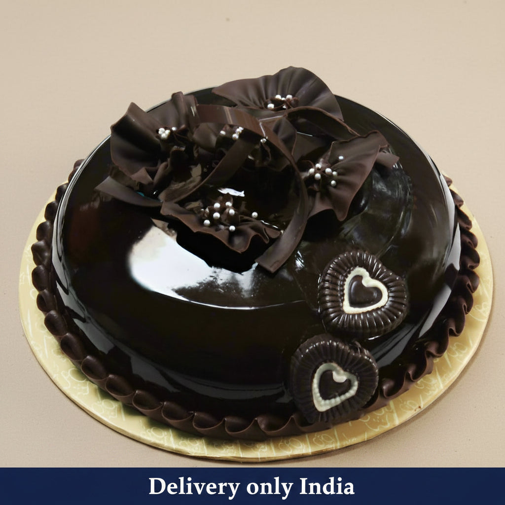 Celebration Rich Chocolate Cake — dark glaze, large curled topping and heart-style side pieces; India