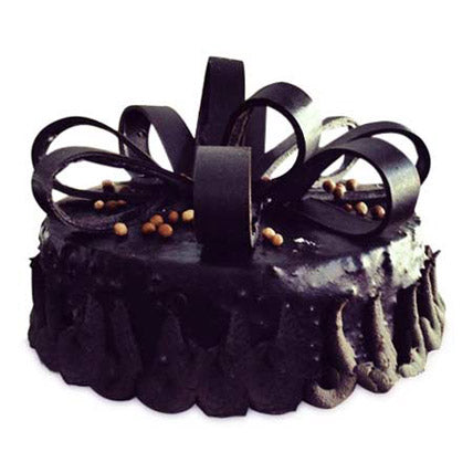 Dark Curled Decoration Cake — dark drip finish with broad curled topping strips; India
