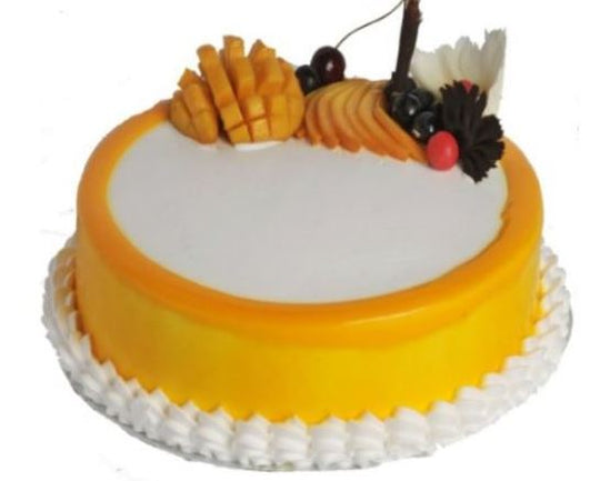 Simple Fruit Cake — white centre, orange band and sliced fruit along the rim; India