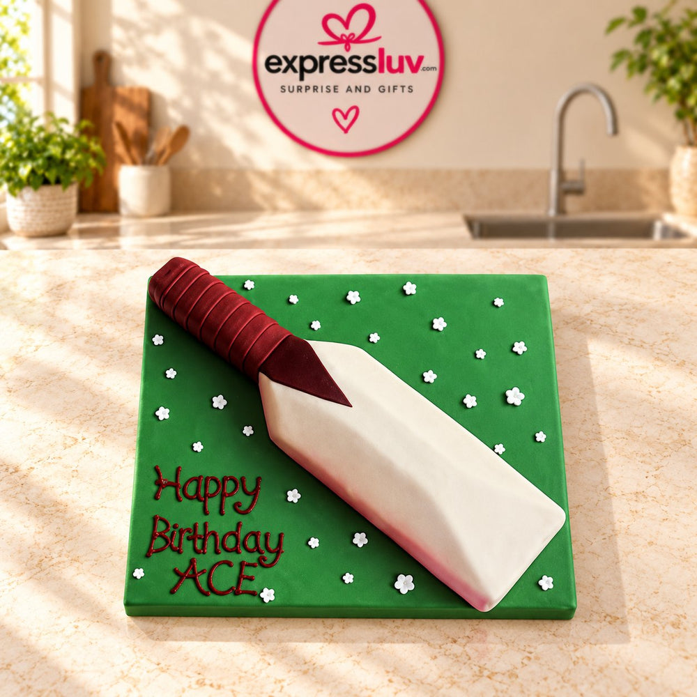 Delicious Cricket Bat Cake, photographed on a sunlit marble counter — delivery in India