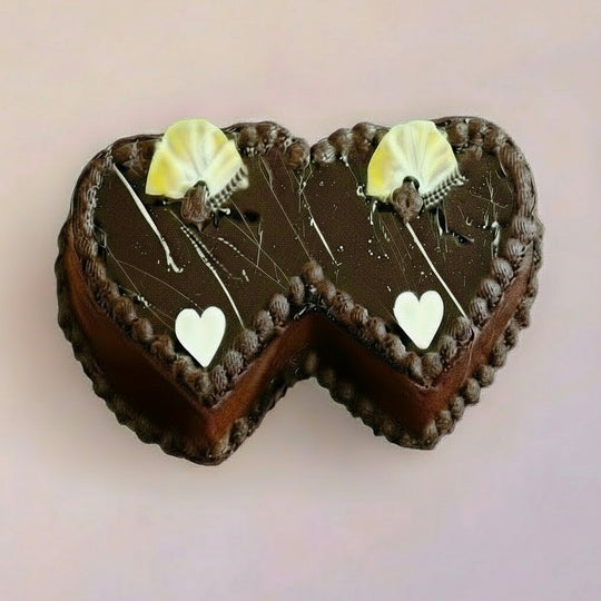 Twin Heart Chocolate Cake - 3 kg — two adjoining chocolate-coloured hearts with pale heart accents; India