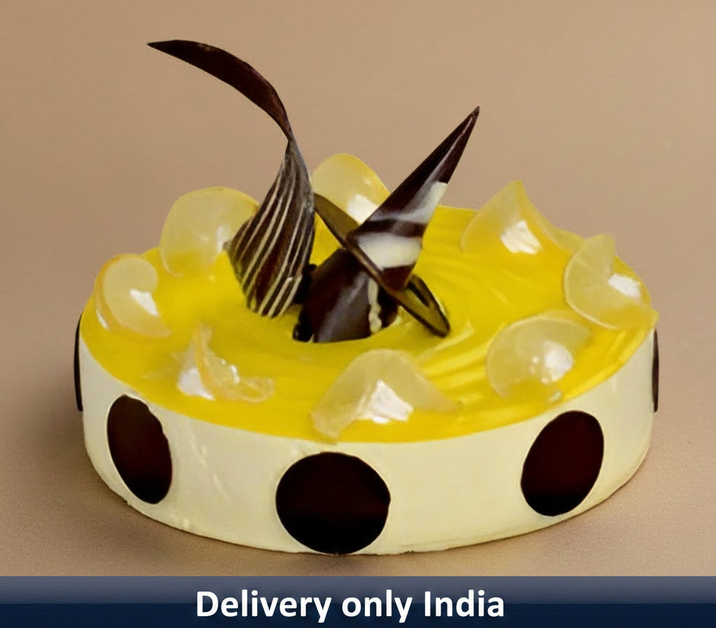 Yellow Tangy Cake — yellow-and-white finish, dark circles and decorative shards; India