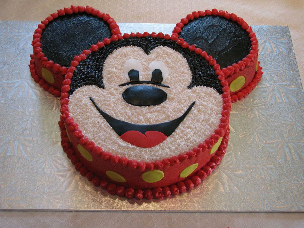 Cartoon Cake — a Mickey Mouse face with red-and-black ear accents; India