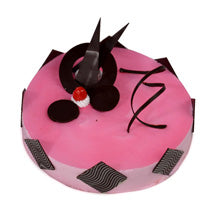 Pink Gel Cake 1 kg — pink glaze with dark decorative shards and thin dark drizzle; India