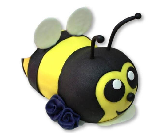 Honey Bee Birthday Cake — a yellow-and-black bee figure with pale wings; India