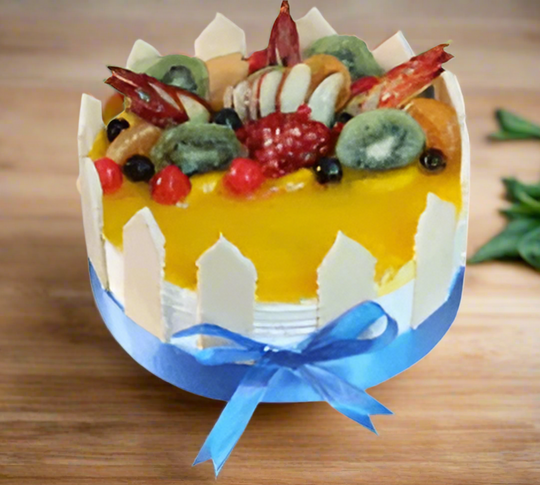 Fruit Special Cake — yellow drip glaze, fruit topping and a blue ribbon; India