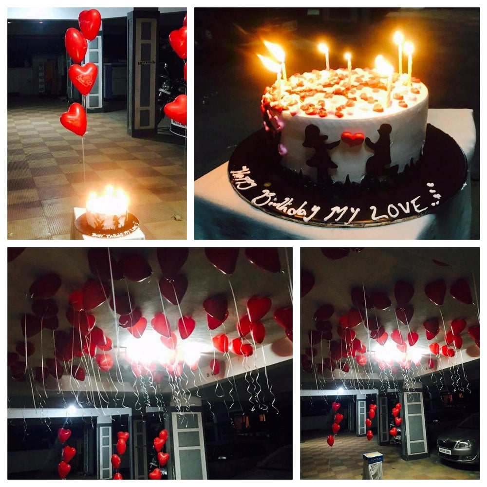 Romantic surprise party setup with balloons, cake and decorations