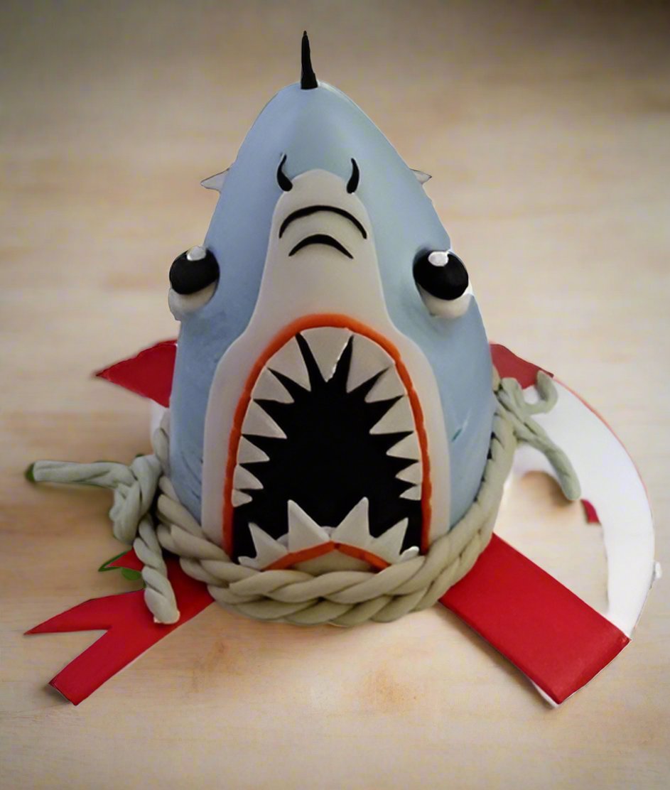 Shark Theme Birthday Cake — a shark head with an open-mouth design; India