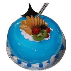 Blue Fresh Fruit Gel Cake — blue glaze and a central mixed-fruit cluster; India