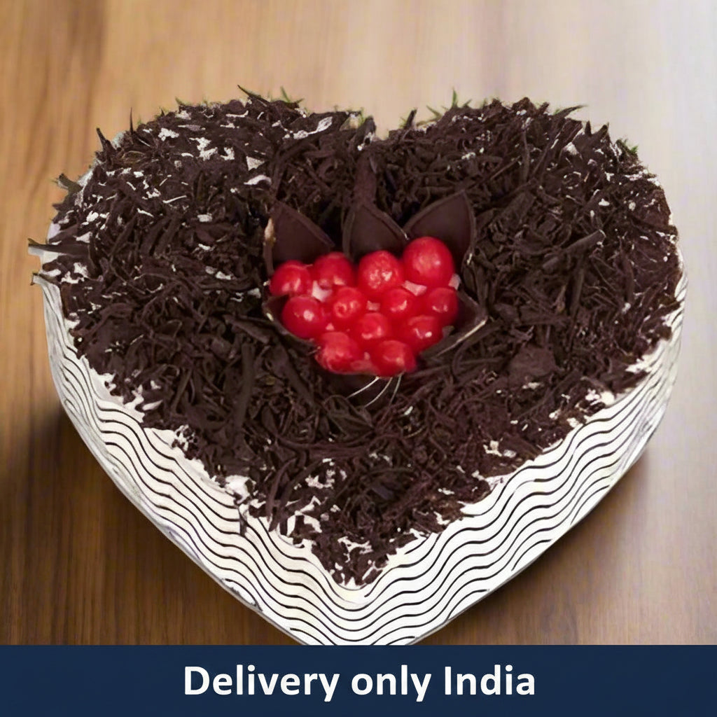Shaving Decor Heart-Shaped Black Forest Cake — dark shavings, a red central topping and white cream borders; India