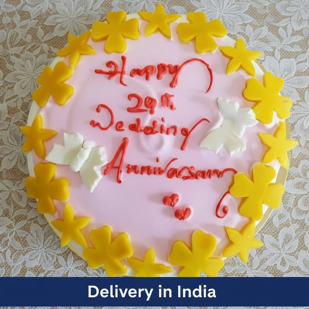Designer Cake — white finish with yellow star-and-butterfly decorations; India