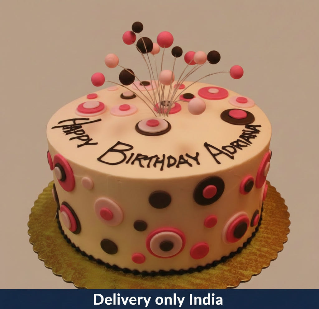 Blueberry Spongy Cake — pink spotted finish and raised colourful ball decorations; India