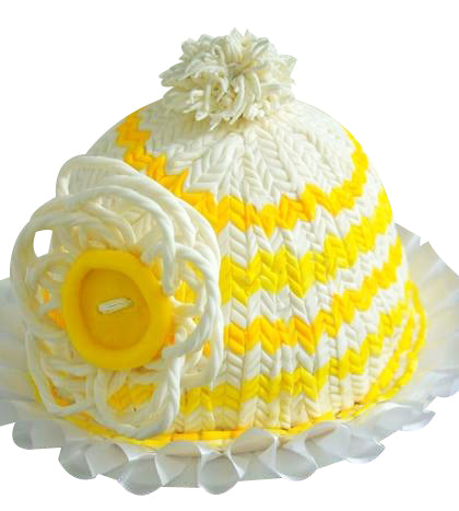 Winter Hat Cake — yellow-and-white knitted-pattern piping; India