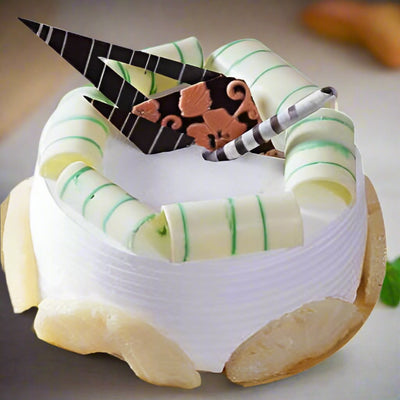 Striped Decor Pineapple Flavour Cake — pale cream finish and striped curled decorations; India