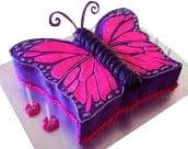 Pink Butterfly Shape Cake — pink-and-purple wings with dark outlined patterns; India