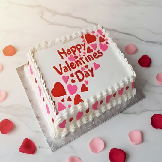 Pineapple Cake for Valentines Day — white finish, red hearts and a Valentine's greeting; India