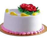 Floral Cream Celebration Cake — white finish with a central floral-style topping and pink border; India
