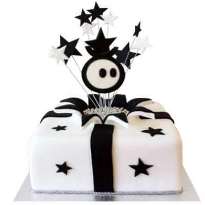 Star Gift Box Cake — white gift-box styling, dark ribbon and star decorations; India
