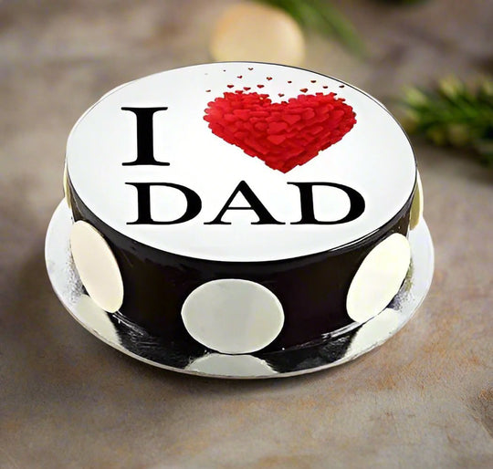 I Love Dad Cake — a white I Love Dad message panel and dark spotted sides; India