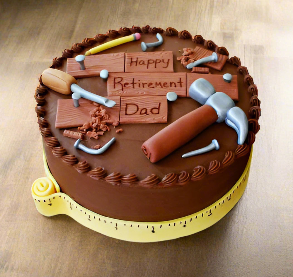 Retirement Cake — retirement-tool decorations and chocolate-coloured sides; India