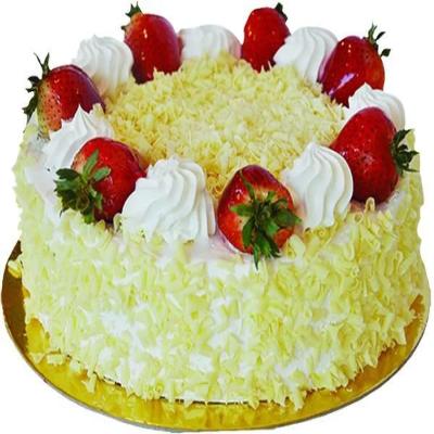 White Forest Cake with Fruits — pale shavings, white piped cream and strawberry topping; India
