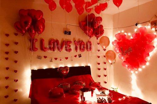 Romantic I Love You room decoration with balloons and lights