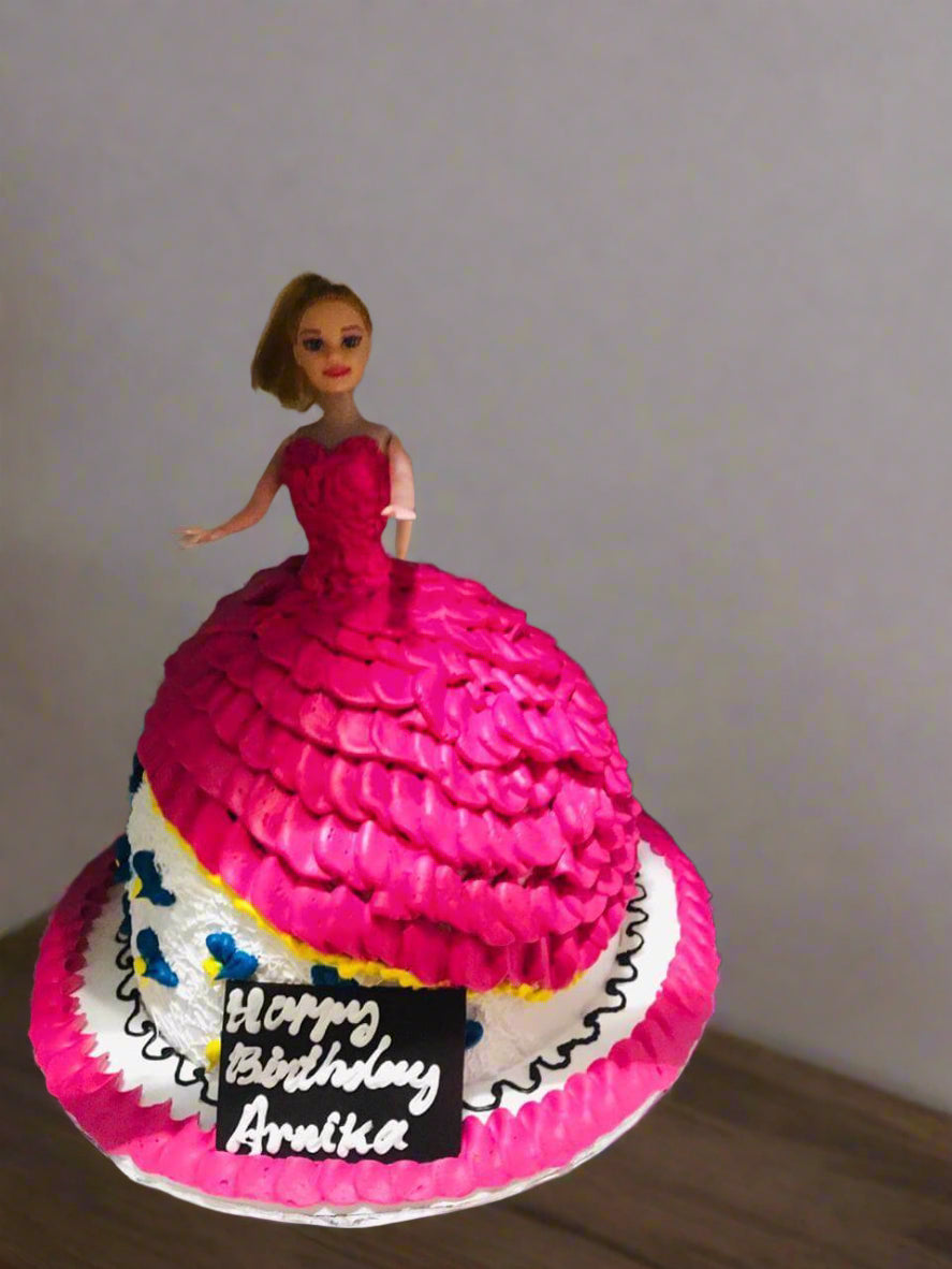 Pink Ruffled Barbie Design Cake — a bright pink ruffled dress design; India