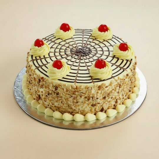 Butterscotch Yummy Cake — golden textured sides and a dark grid pattern on pale cream; India