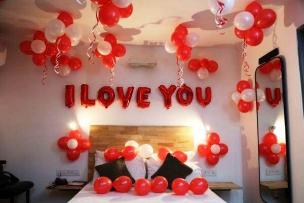 I Love You theme room decoration with balloons and romantic setup