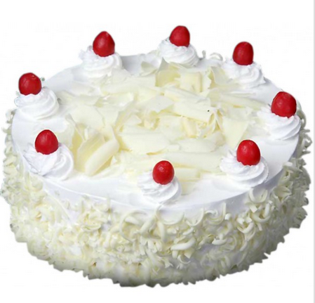 Round Shaving Decor White Forest Cake — pale shavings and cream dollops with red cherries; India
